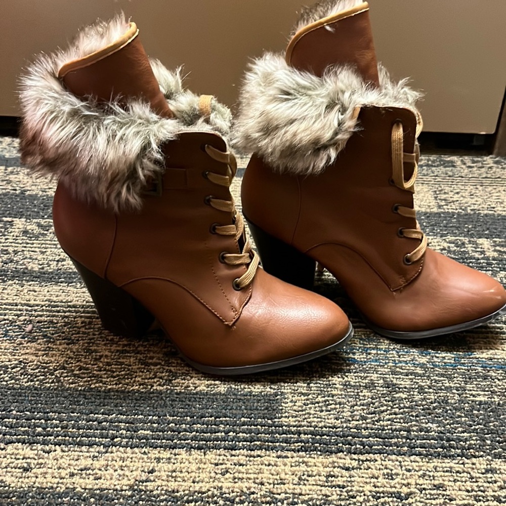 These are a pair of Charlotte Russe Ankle Heel Boots